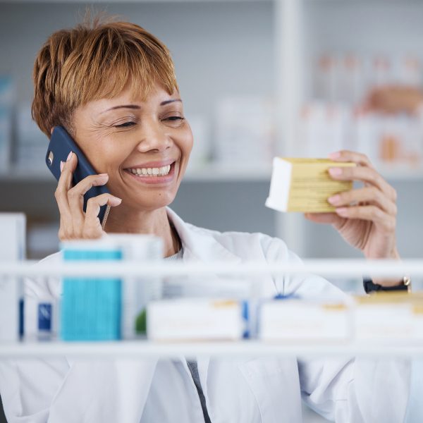 Consulting, conversation and pharmacist on a phone call about medicine information or ingredients. Medical, talking and mature female doctor speaking about pills, advice and prescription on a mobile Consulting, conversation and pharmacist on a phone call about medicine information or ingredients. Medical, talking and mature female doctor speaking about pills, advice and prescription on a mobile.